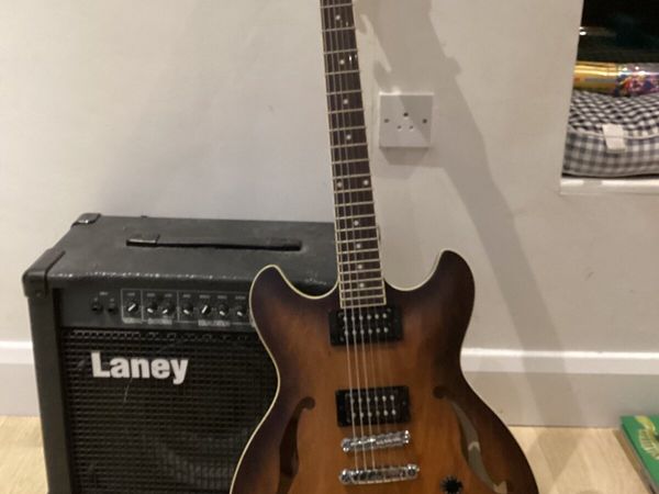 Electric guitar + amp. - Main image