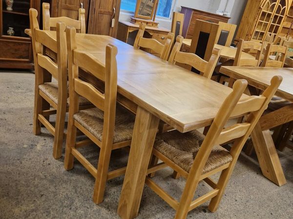 Extendable oak table, 6 ladder back oak chairs - Main image