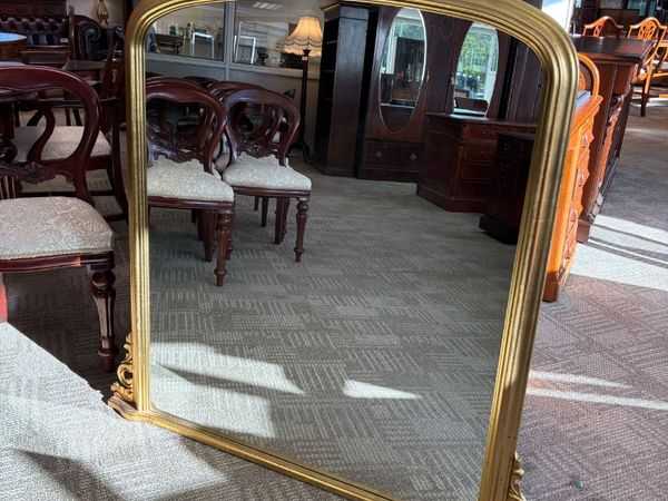 A beautiful traditional-style overmantel mirror fe - Main image