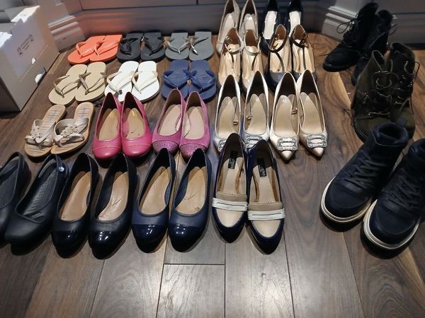 Full wardrobe of 22 pairs of size 5(38) shoes and boots, including Faith, Clarkes, Havianas, flip flops, Crocs, work shoes, court shoes, dressy shoes, high heel boots, and waterproof hiking boots. - Main image