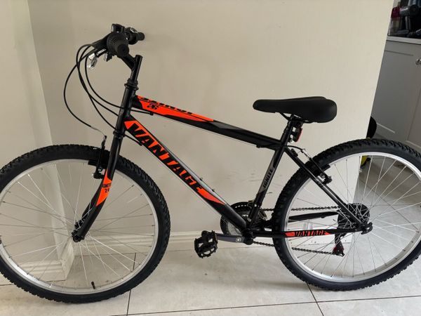 brand new bicycle and helmet - Main image