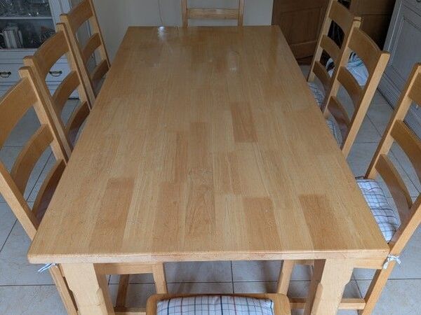 8 seater wooden dining table and chairs - Main image