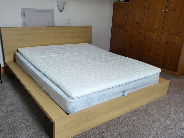 King bed and mattress with ikea topper. - Main image