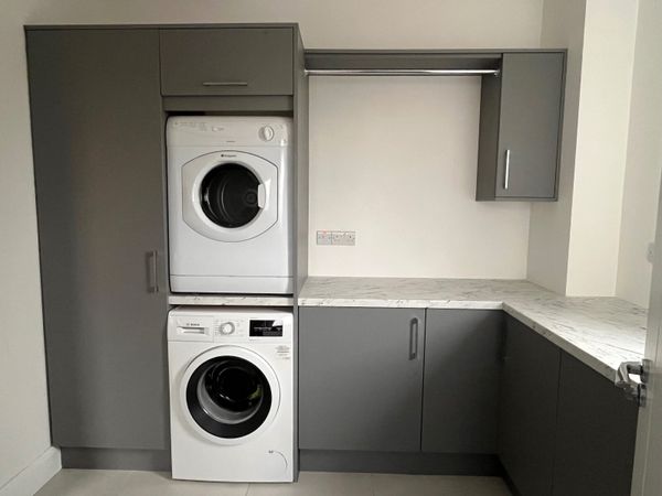 Kitchen cupboards and sink - Main image