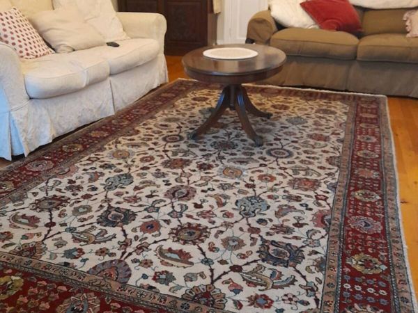 Cream ground rug with  multi colour pattern - Main image