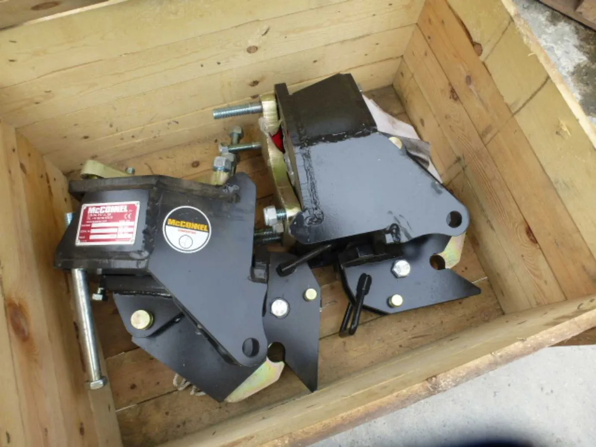 Large selection of McConnel H/cutter axle brackets - Image 4