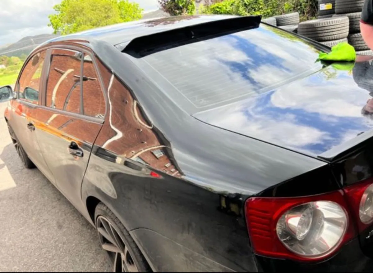 Roof spoiler jetta mk5