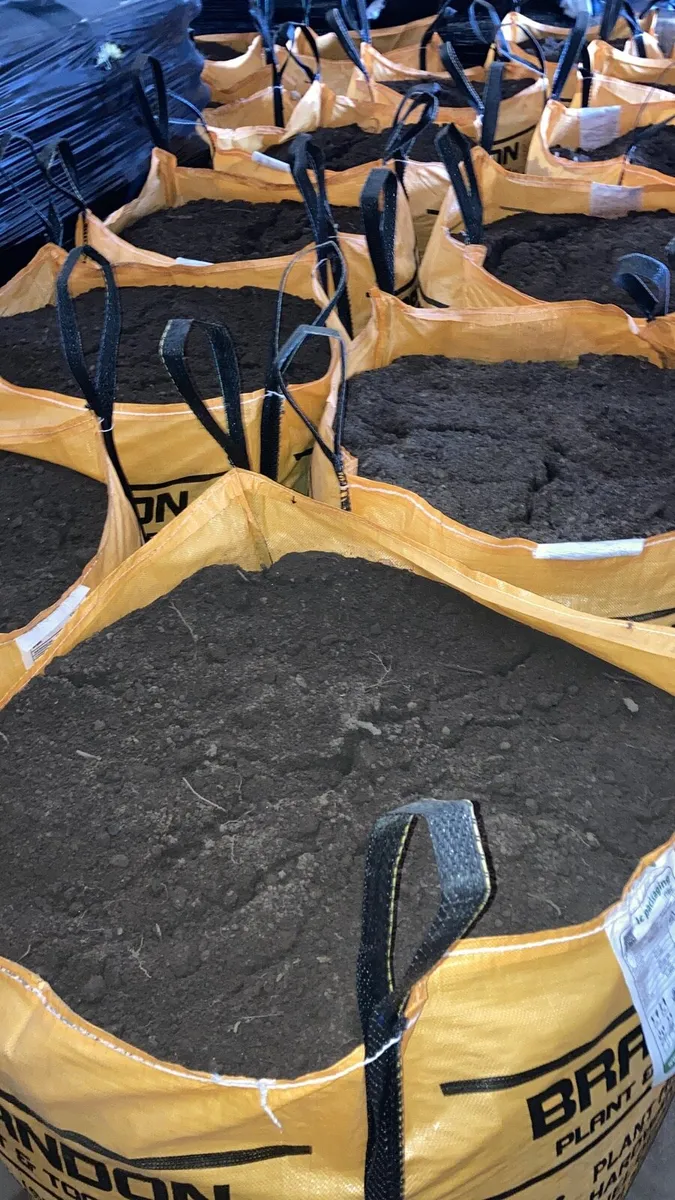 Screened topsoil,bark mulch decorative stone - Image 1