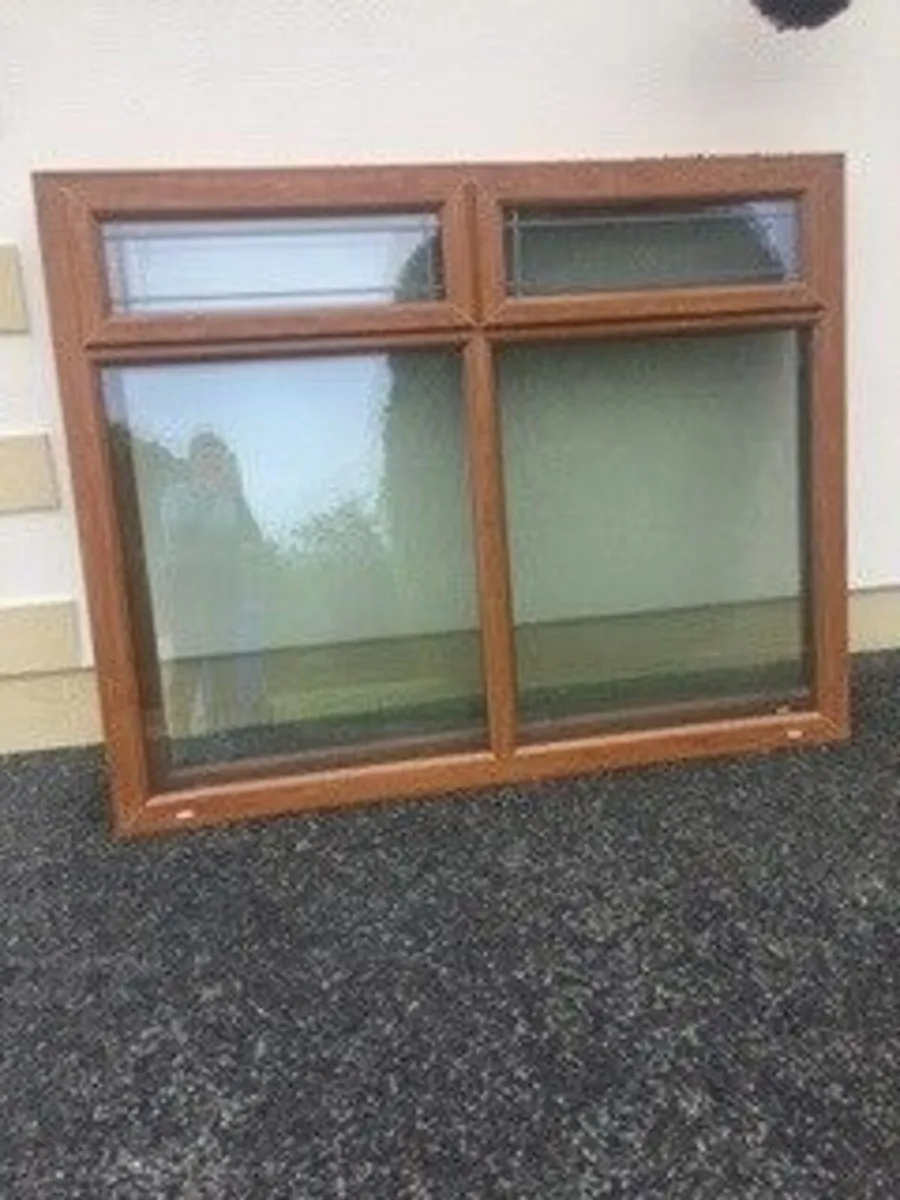 Double glazed window with top opening