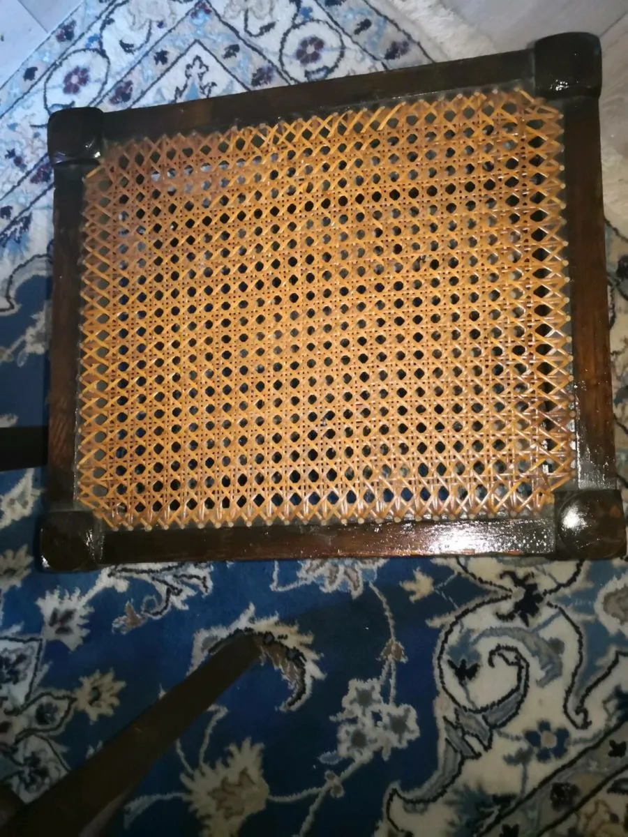Antique solid wood foot rest with cane top - Image 2