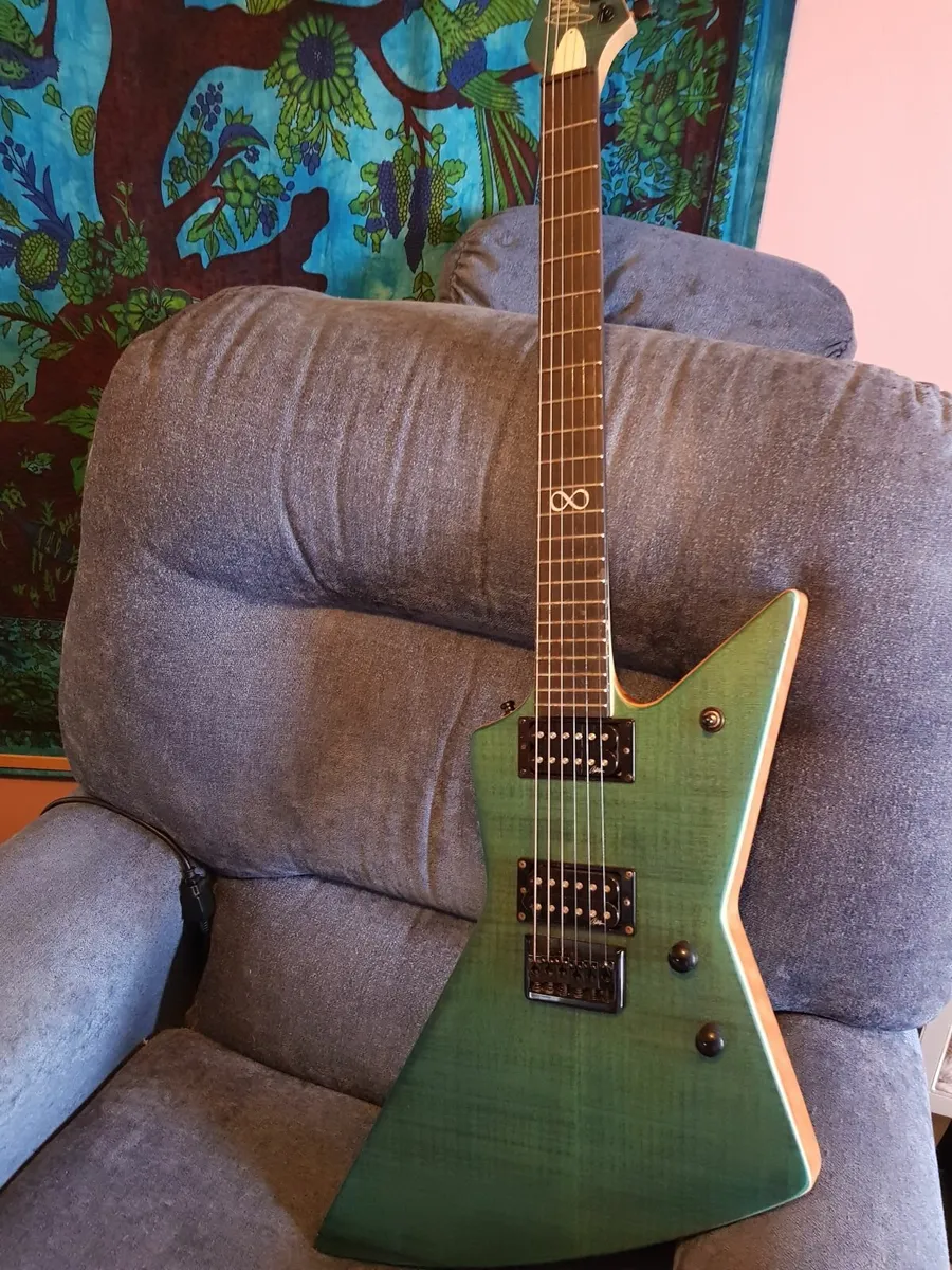 Chapman Guitars Ghost Fret Flame Blue Explorer. - Image 1