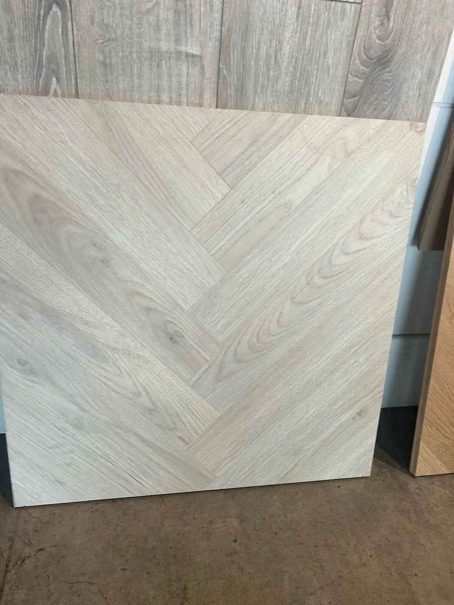 Herringbone laminate floor 12mm - Image 1