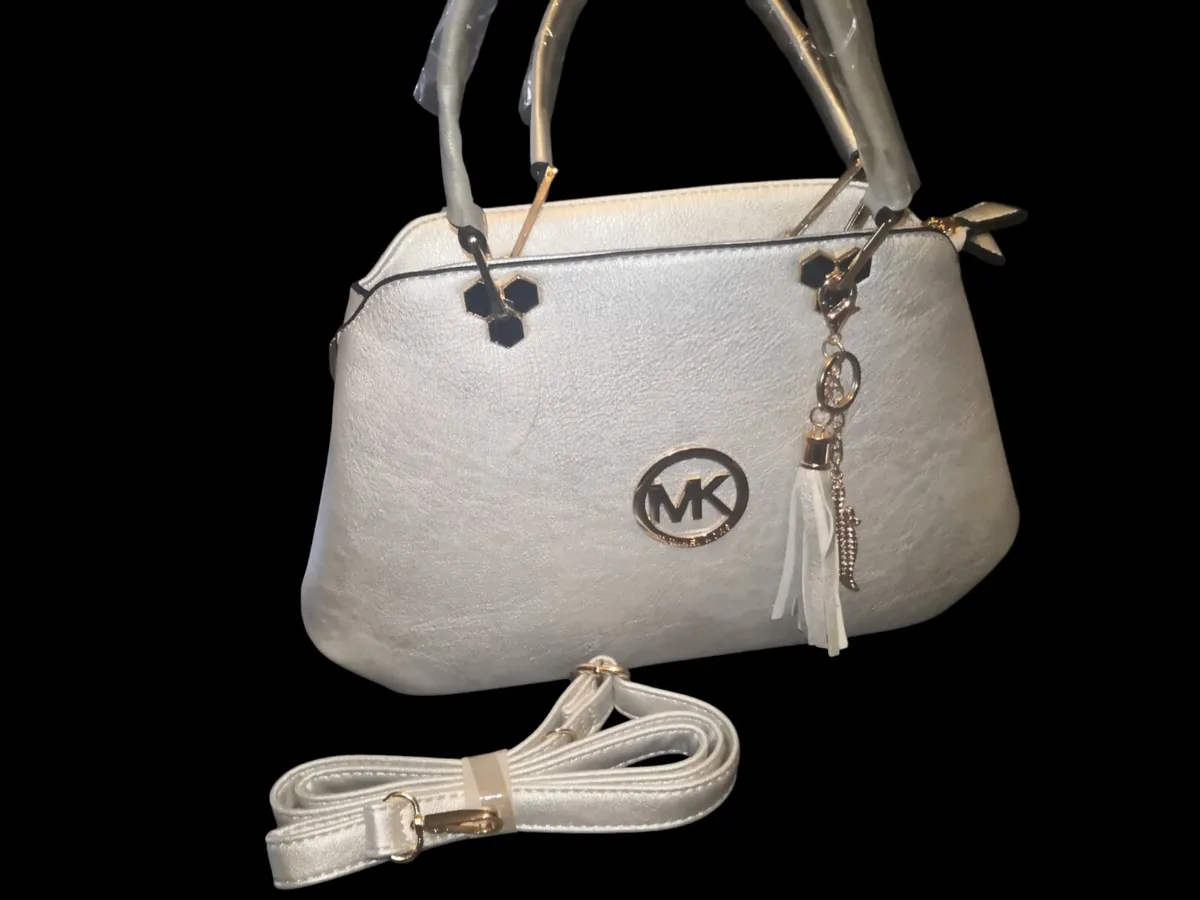 New silver handbag