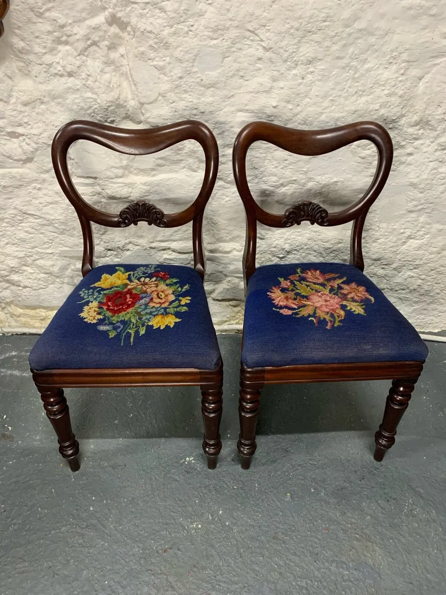 A pair of Victorian mahogany balloon back chairs. - Image 1