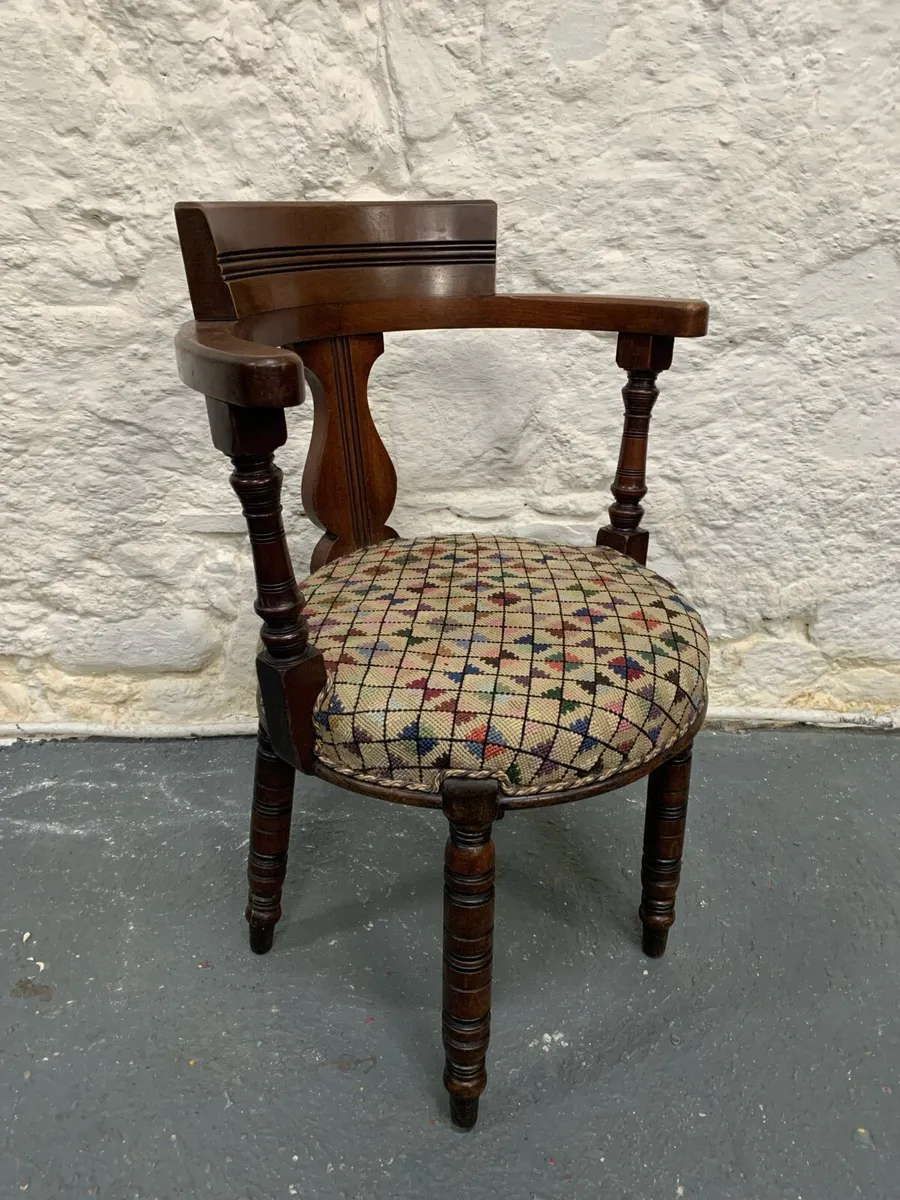 A late Victorian walnut desk chair. - Image 1