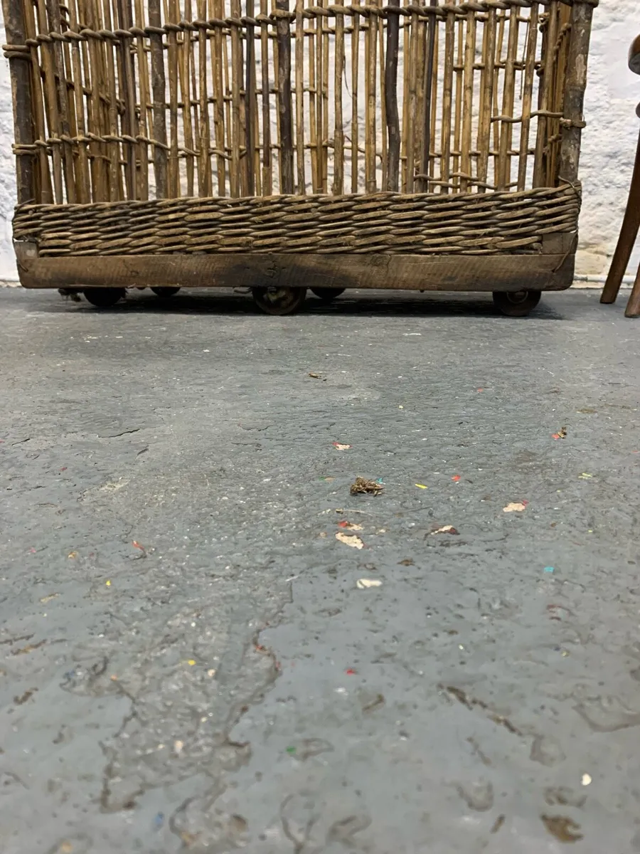 Victorian cane and metal laundry basket on wheels - Image 4