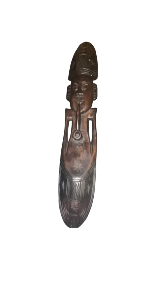 Large hand carved mask with pipe