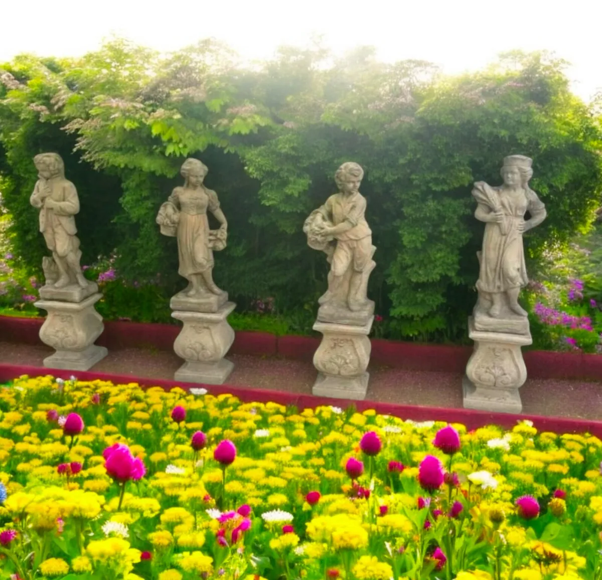 Set of four stone season statues - Image 1