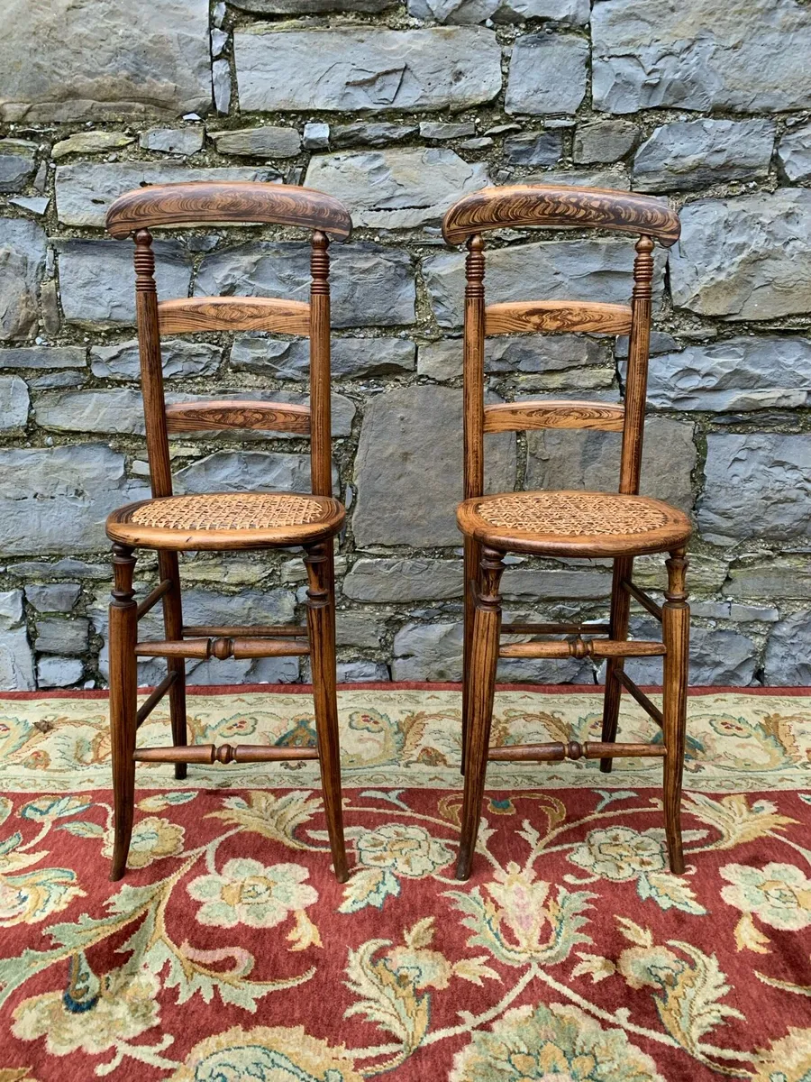 A pair of Early Victorian correction chairs. - Image 1