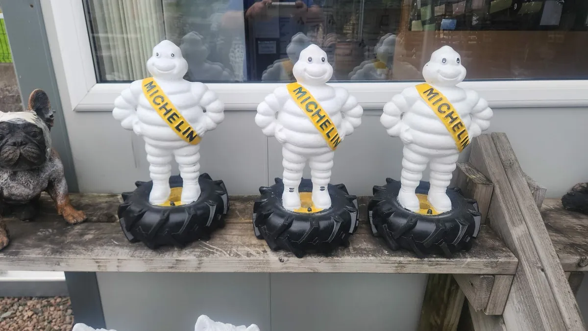 Stone Michelin man tyre ornament - Image 1