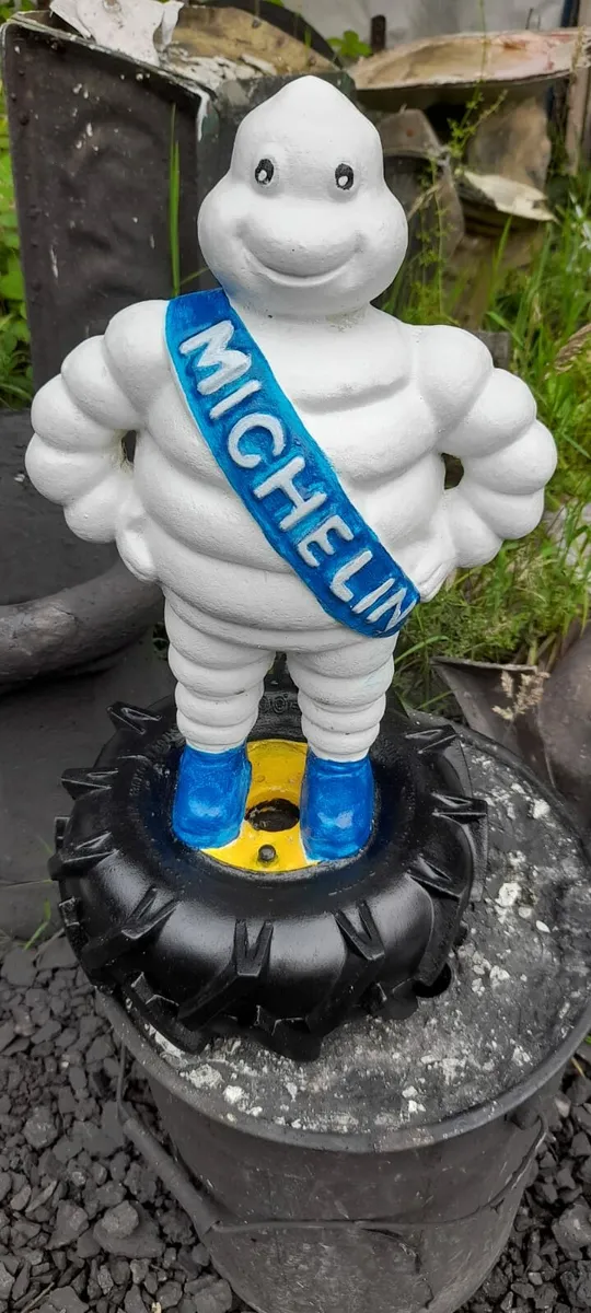 Stone Michelin man tyre ornament - Image 3