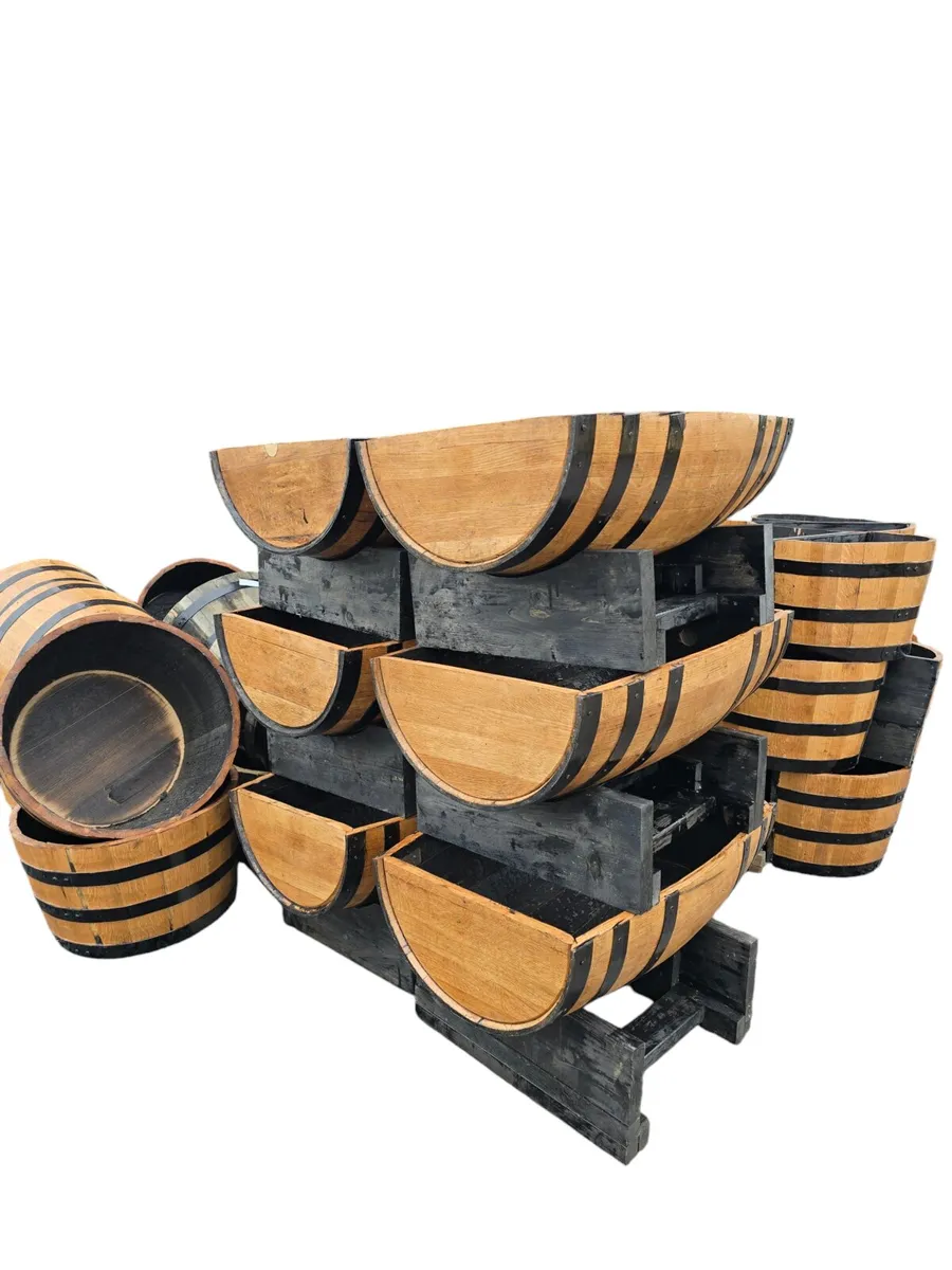 ½ cut oak barrel planters on wheels - Image 1