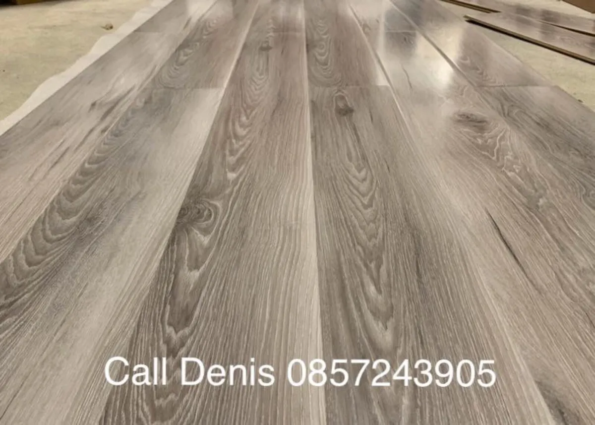 New 12mm High Gloss Grey Laminated Flooring - Image 2
