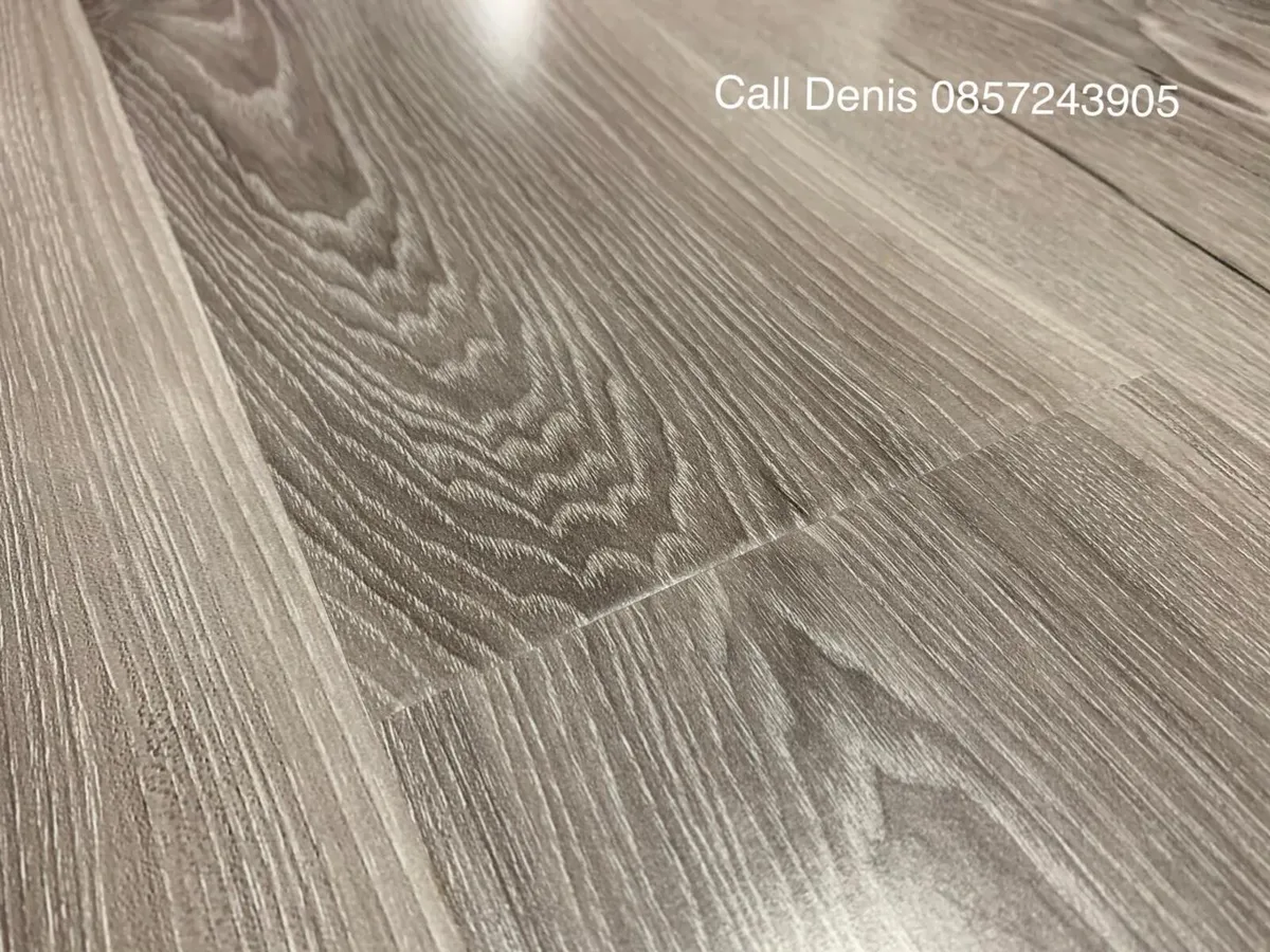 New 12mm High Gloss Grey Laminated Flooring - Image 3