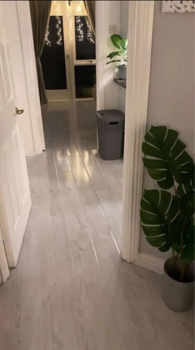 New 12mm Ice Laminated Flooring - Image 1