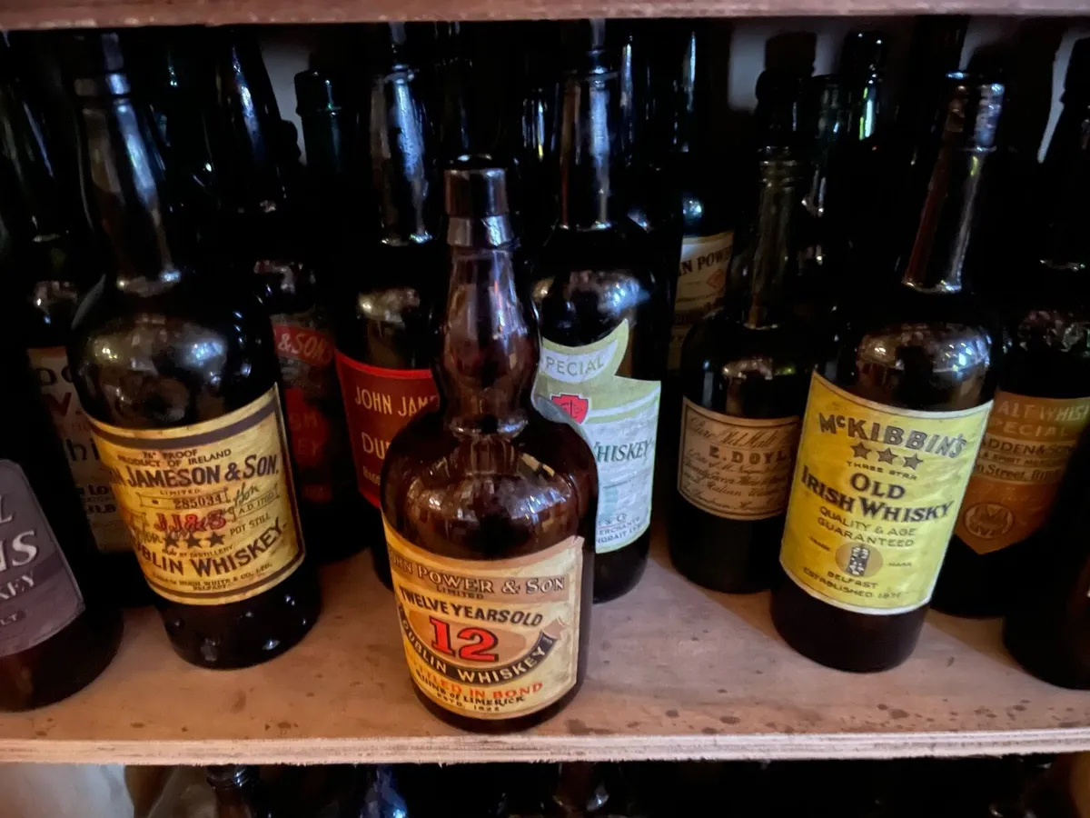 set of 12  vintage whiskey bottles - Image 1