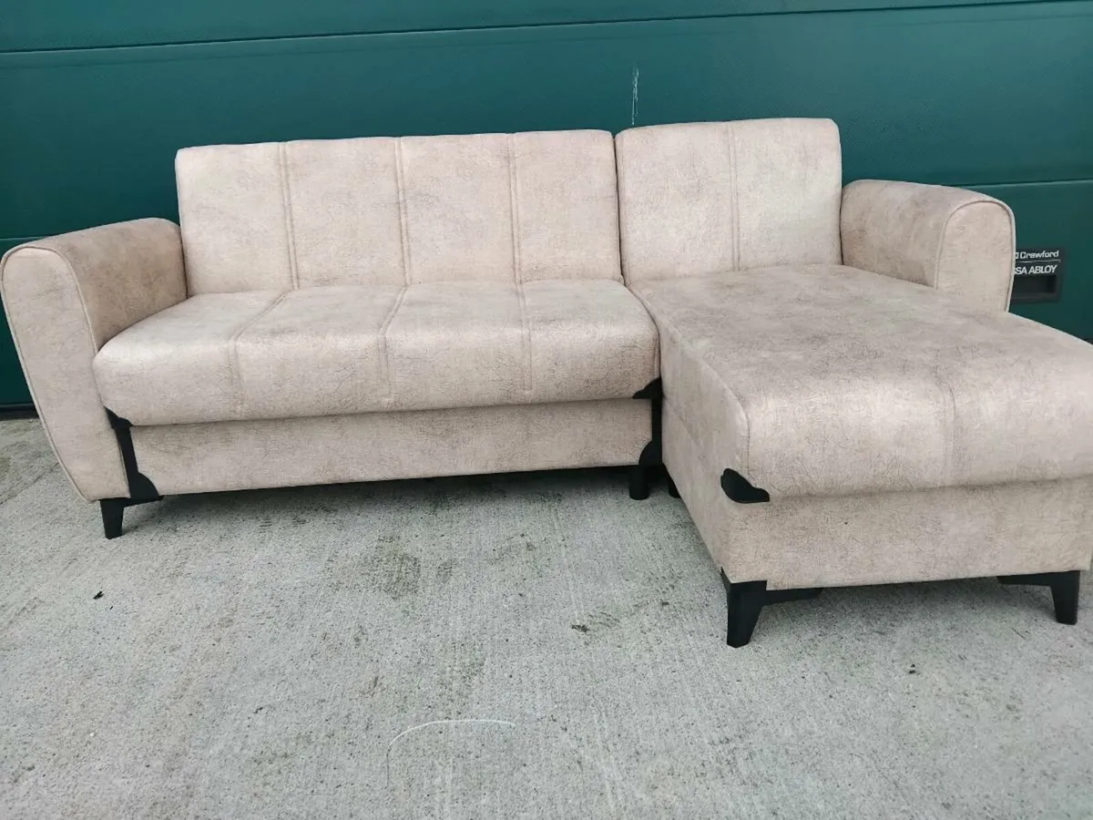 Beige corner sofa bed with storage - Image 1