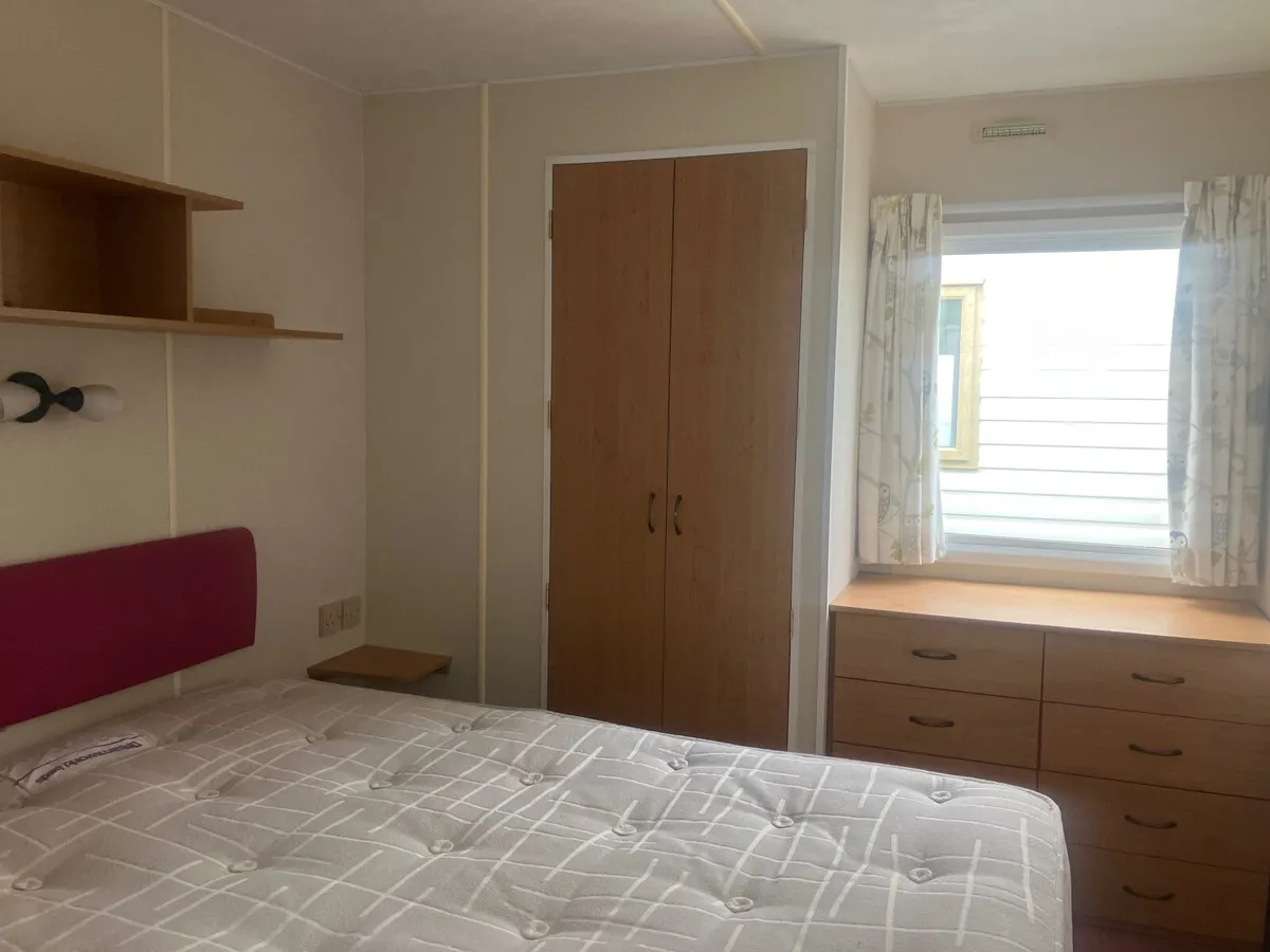 SNAPPED UP.PLENTY OF NATURAL SUNLIGHT IN THIS HOME - Image 2