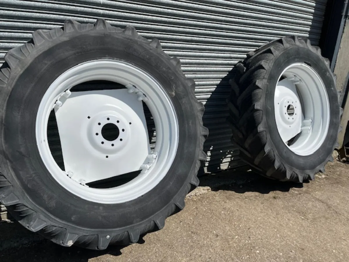 16.9 x 38 New Holland Wheels c/w Tarus Tyres - Image 1