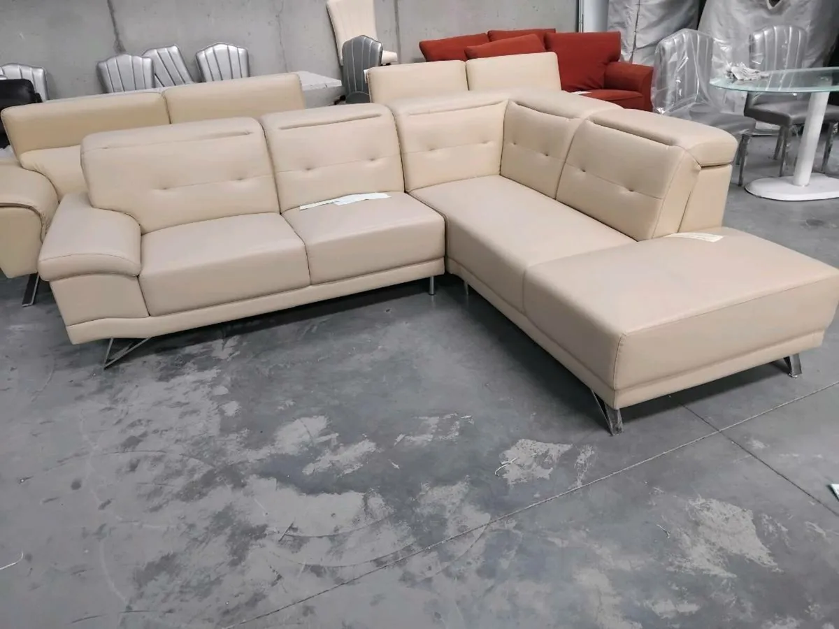 Cream corner sofa 2 mtr 60 x 230