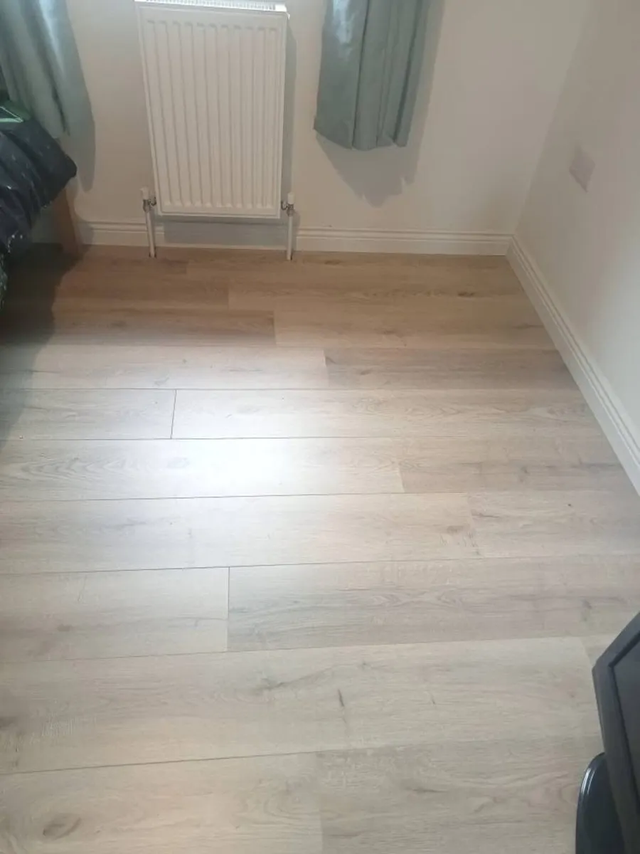New 8mm Beige Laminated Flooring - Image 4