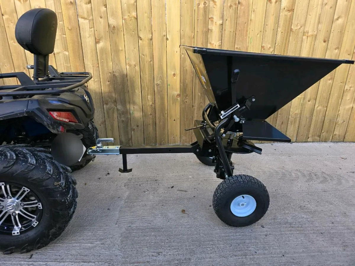 Towable quad ride on lawnmower fertilizer spreader - Image 1