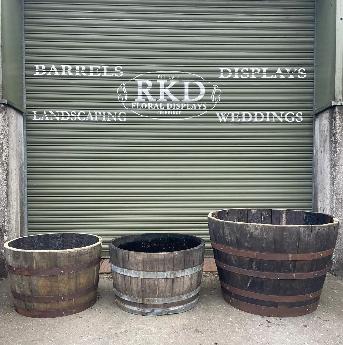 Whiskey Barrel Planters - Durable & Decorative - Image 1