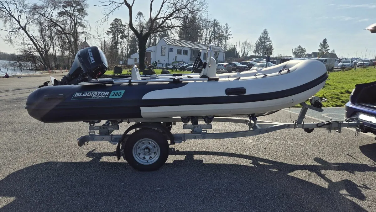 3.8m RIB, trailer and 20HP Suzuki engine - Image 1