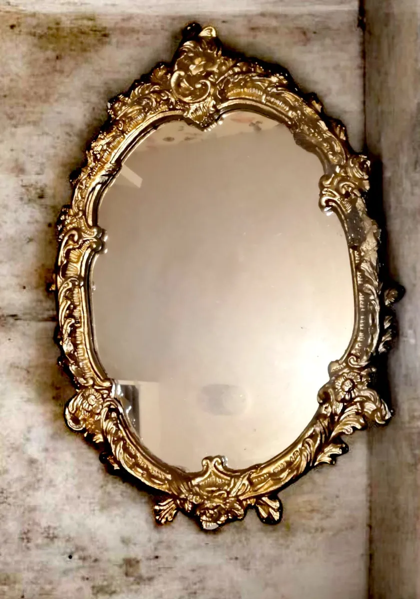 Large and heavy ornate mirror
