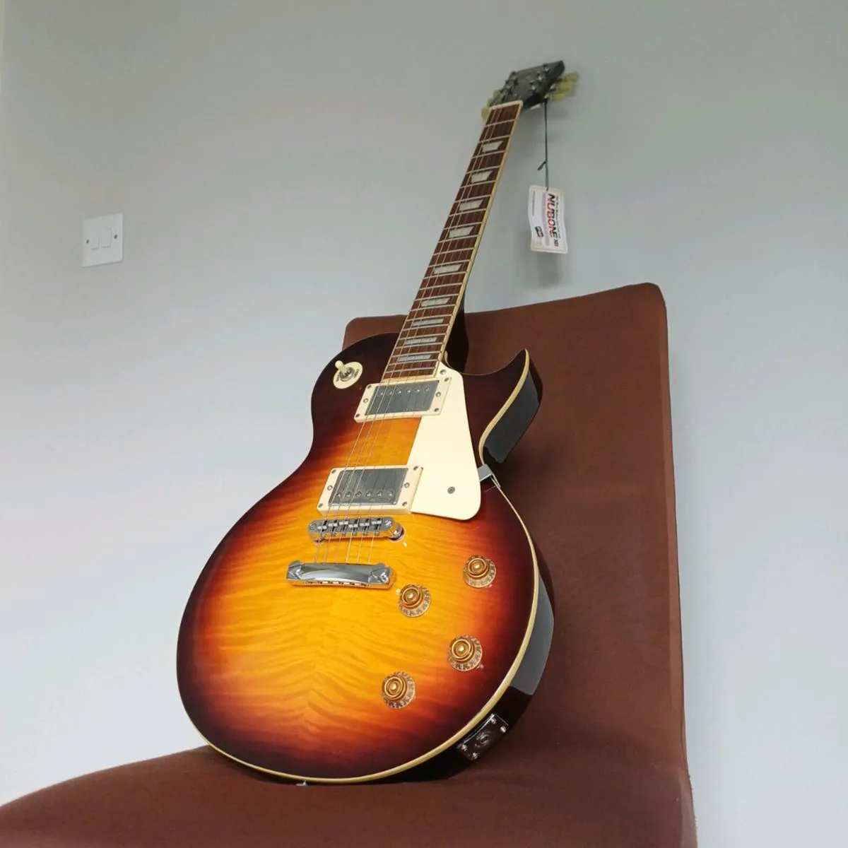 Vintage V100 Electric Guitar Flamed Iced Tea - Image 1