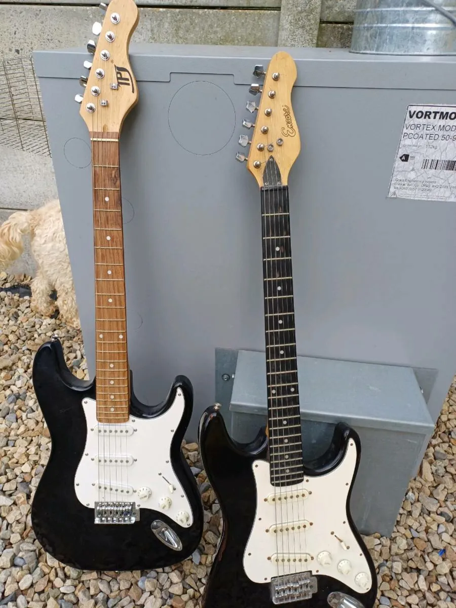 2 Vintage Stratocaster Electric Guitars - Image 1