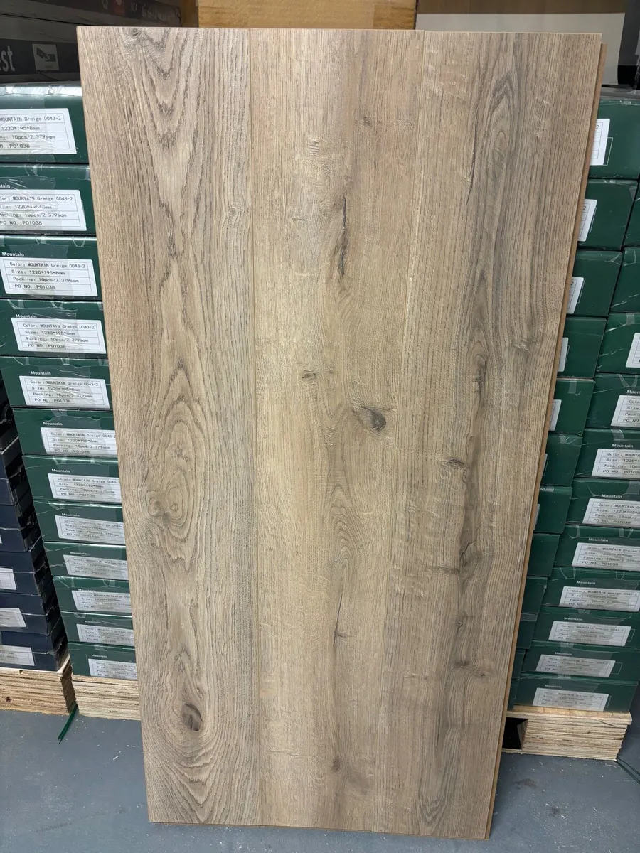 New 8mm Beige Laminated Flooring - Image 1