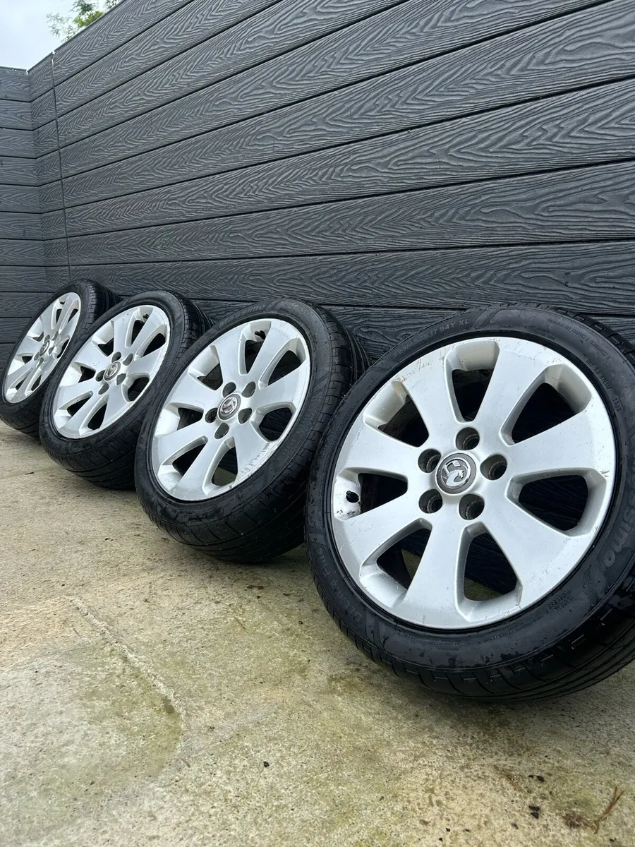 17” GENUINE VAUXHALL ALLOY WHEELS & TYRES - Image 1
