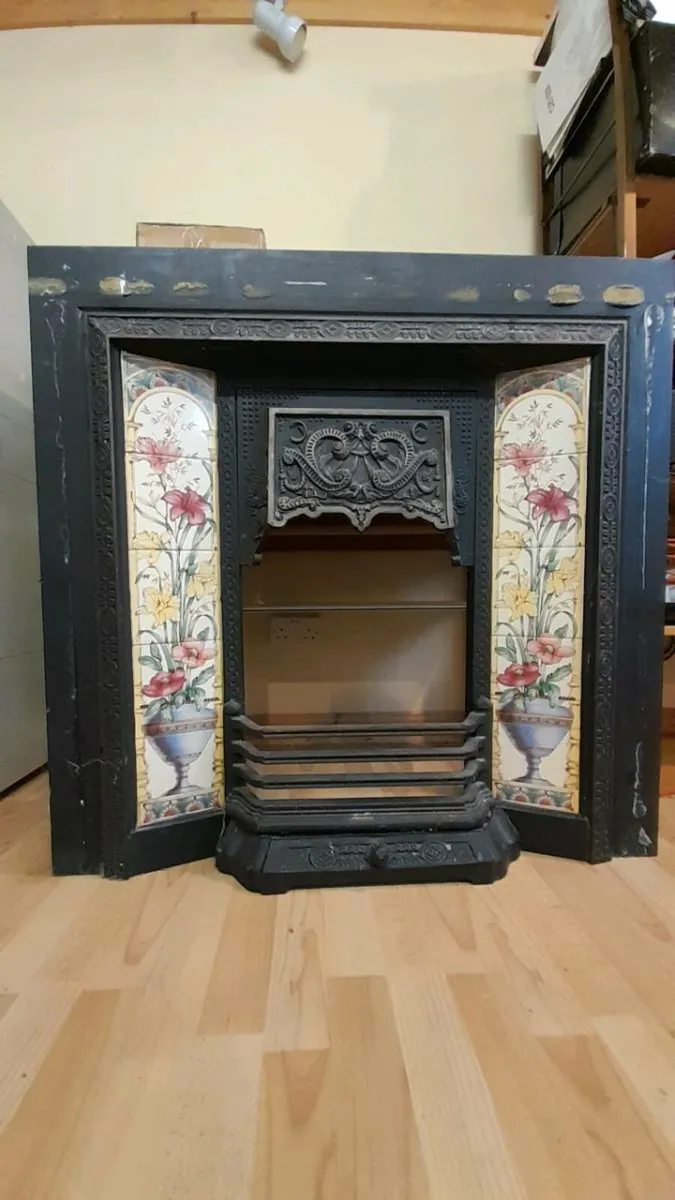 Antique style cast iron fireplace with surround. - Image 2