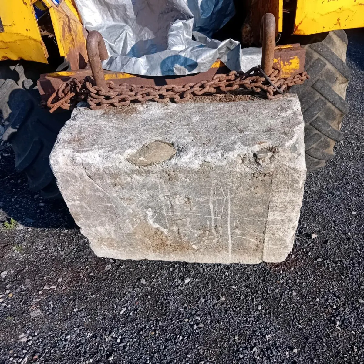 One  16.9x28  tire and rim and concrete weight - Image 3