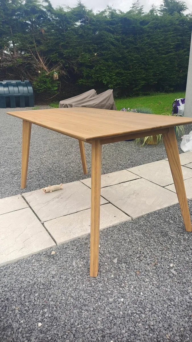 Dining room table. - Image 1