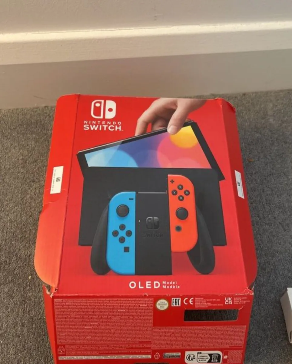 Nintendo Switch  Excellent Condition + FREE Mario - Image 1