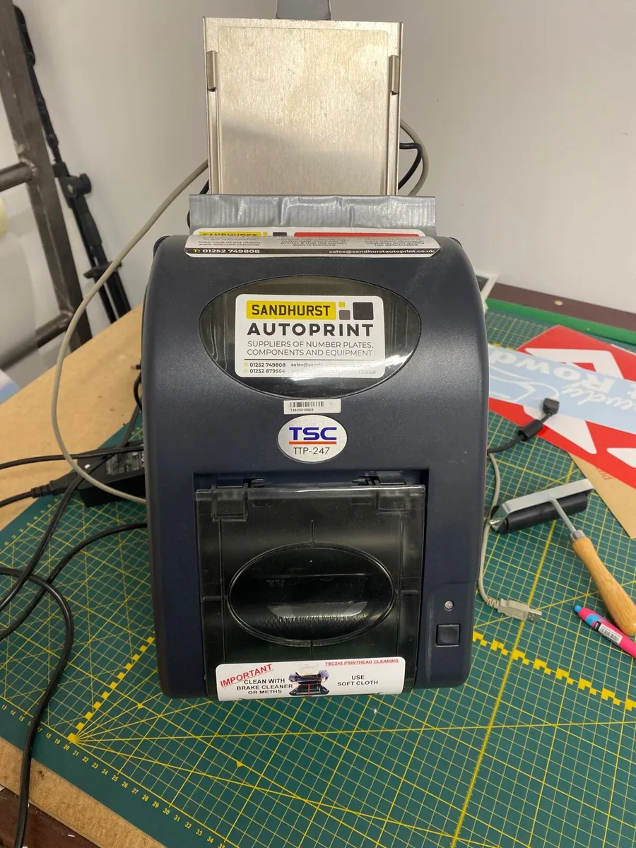 Registration plate printer and roller - Image 1