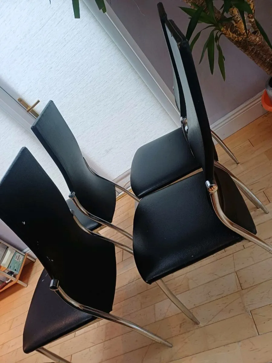 Extendable black glass kitchen table and chairs - Image 3