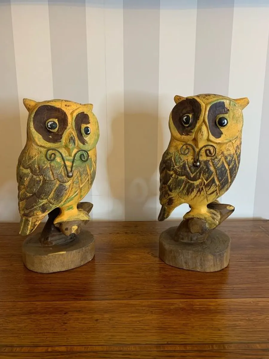 Pair of hand carved wooden owls on perches. - Image 1